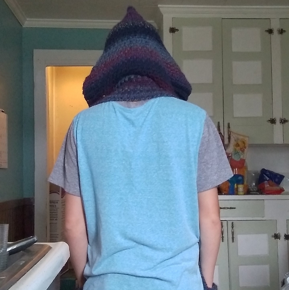 Hooded scarf with pockets